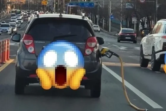 주유건 달고 달리는 차량…무슨 이유로…